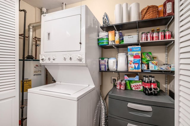 2423 Hooverside Ln, Grove City, OH 43123 - washroom with stacked washer / dryer and electric water heater