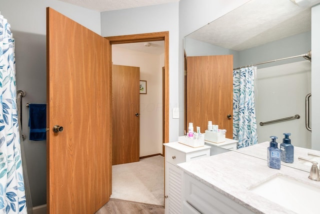 2423 Hooverside Ln, Grove City, OH 43123 - bathroom featuring vanity and a textured ceiling