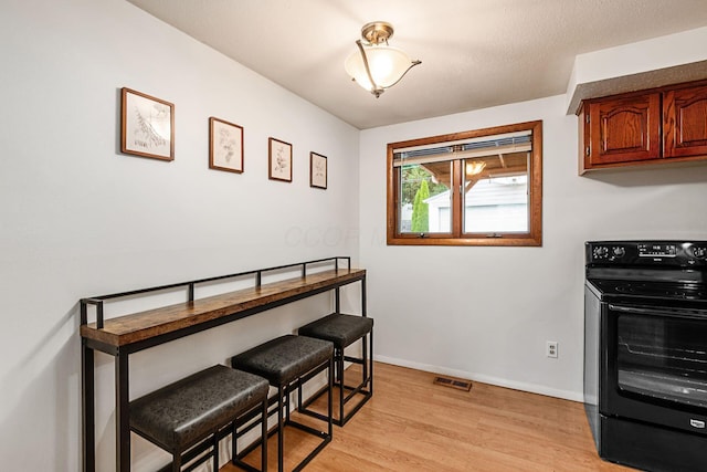815 Savannah Dr, Columbus, OH 43228 - dining room with light wood finished floors and baseboards