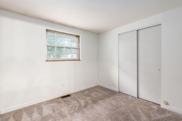 815 Savannah Dr, Columbus, OH 43228 - unfurnished bedroom with carpet flooring and a closet