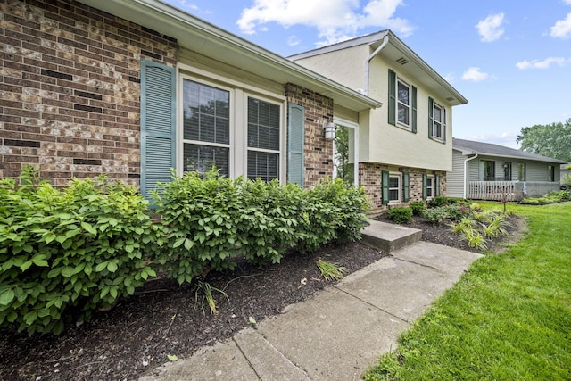 4150 Demorest Rd, Grove City, OH 43123 - view of front of house with brick siding and stucco siding