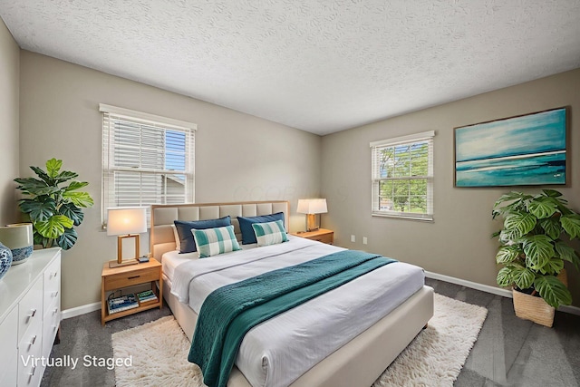 4150 Demorest Rd, Grove City, OH 43123 - carpeted bedroom with baseboards and a textured ceiling
