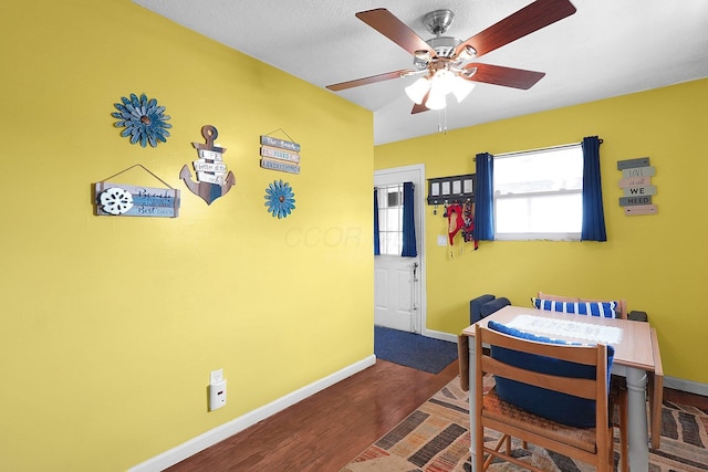 13111 King Rd NE, Thornville, OH 43076 - dining room with ceiling fan, baseboards, and wood finished floors