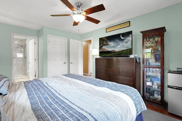 13111 King Rd NE, Thornville, OH 43076 - bedroom featuring a ceiling fan, freestanding refrigerator, and ensuite bathroom