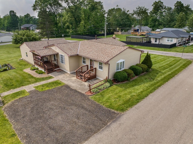 13111 King Rd NE, Thornville, OH 43076 - view of front of house with a shingled roof and a front lawn