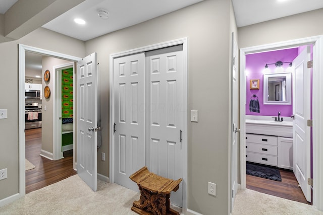 565 S Kellner Rd, Columbus, OH 43209 - foyer with dark carpet, baseboards, and recessed lighting
