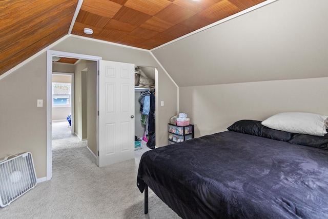 565 S Kellner Rd, Columbus, OH 43209 - carpeted bedroom with vaulted ceiling, wooden ceiling, baseboards, and a closet