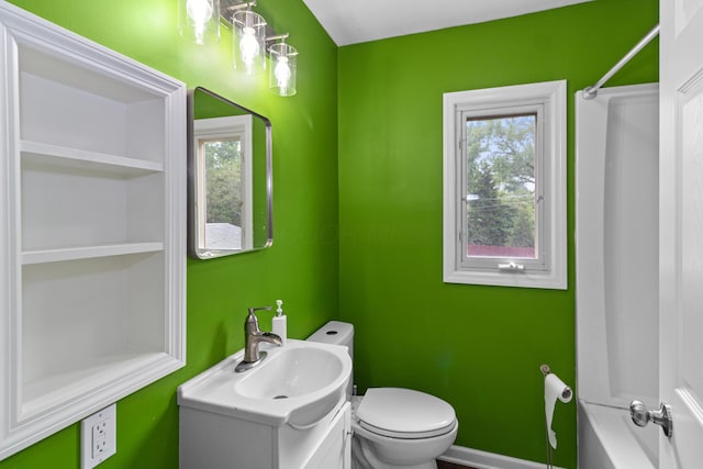 565 S Kellner Rd, Columbus, OH 43209 - full bathroom featuring vanity, toilet, baseboards, and shower / washtub combination