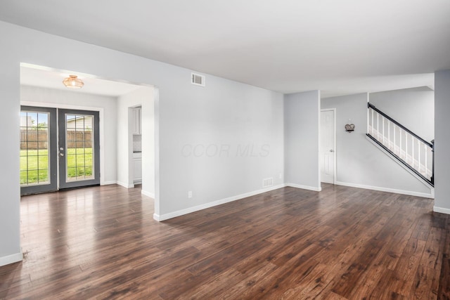 5186 Meadowbrook Dr, Columbus, OH 43207 - spare room with dark wood-style flooring, stairway, and baseboards