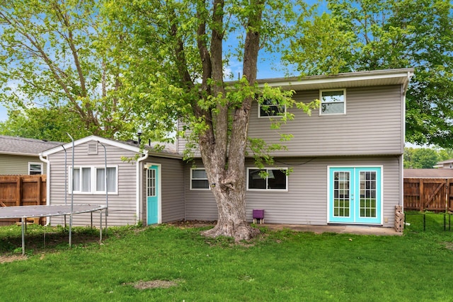 5186 Meadowbrook Dr, Columbus, OH 43207 - back of house with a trampoline and french doors