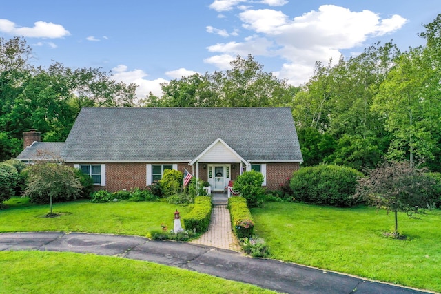 445 Cedar Hill Rd SW, Amanda, OH 43102 - view of front of home featuring a front yard, brick siding, and a chimney