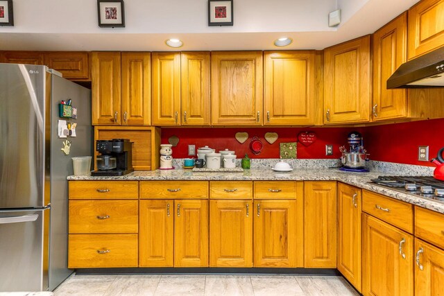 445 Cedar Hill Rd SW, Amanda, OH 43102 - kitchen featuring stainless steel appliances, brown cabinetry, light stone counters, ventilation hood, and recessed lighting