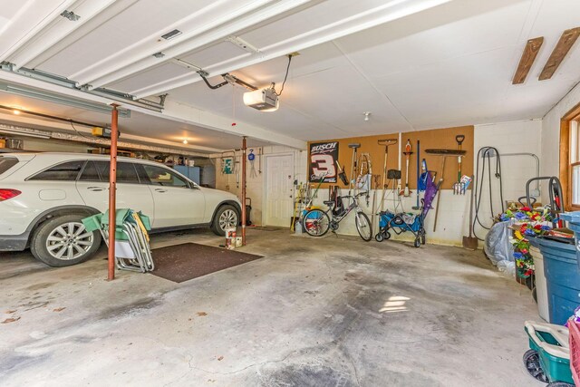 445 Cedar Hill Rd SW, Amanda, OH 43102 - garage featuring a garage door opener
