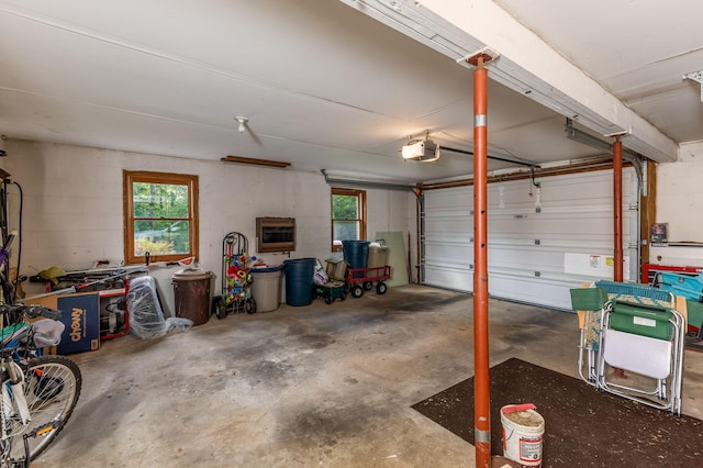 445 Cedar Hill Rd SW, Amanda, OH 43102 - garage with a garage door opener and concrete block wall