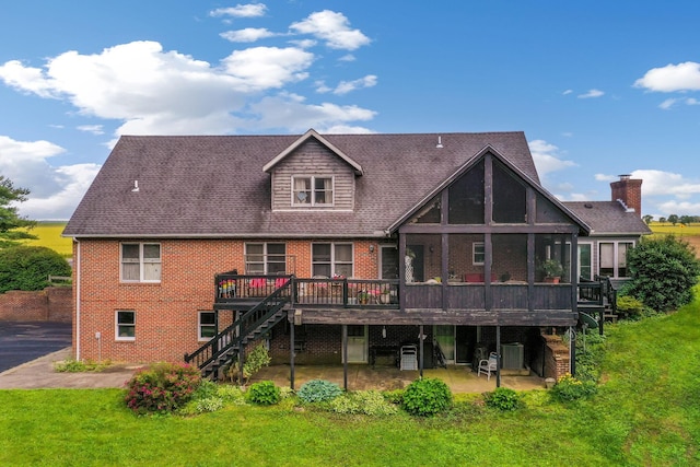 445 Cedar Hill Rd SW, Amanda, OH 43102 - back of property featuring stairway, a wooden deck, brick siding, a patio area, and a lawn