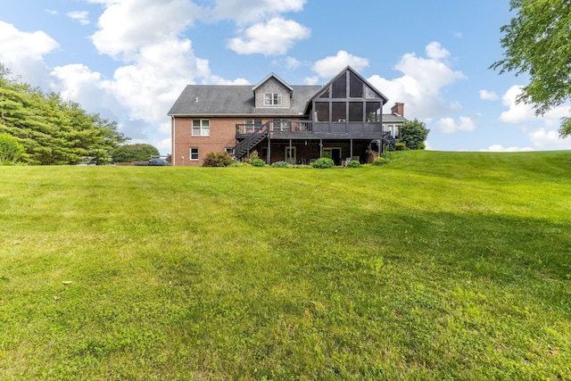 445 Cedar Hill Rd SW, Amanda, OH 43102 - rear view of property featuring stairs, a sunroom, a wooden deck, a lawn, and brick siding