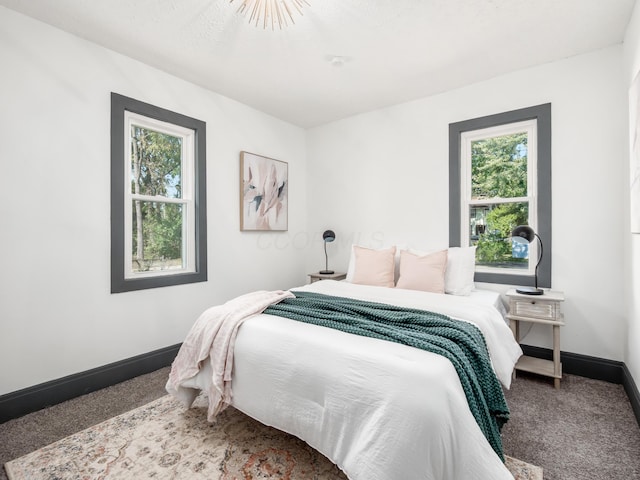1432 Cordell Ave, Columbus, OH 43211 - carpeted bedroom featuring baseboards