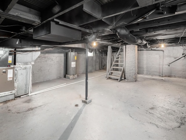 1432 Cordell Ave, Columbus, OH 43211 - unfinished basement with water heater and stairway
