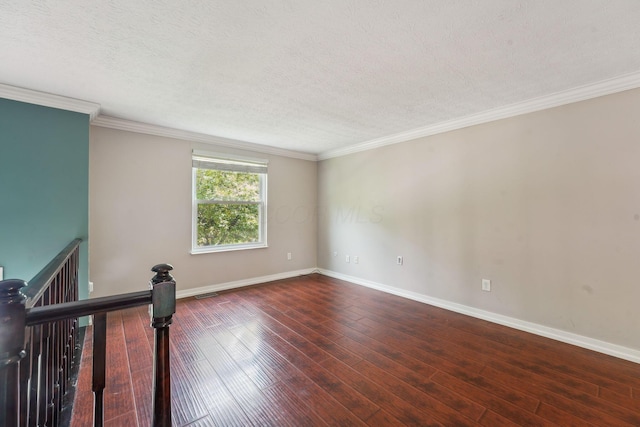 3840 Farm Brook Ln, Columbus, OH 43204 - spare room featuring wood-type flooring, a textured ceiling, and ornamental molding