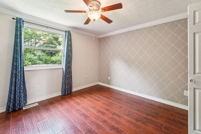 3840 Farm Brook Ln, Columbus, OH 43204 - empty room with wallpapered walls, hardwood / wood-style floors, a textured ceiling, ceiling fan, and crown molding