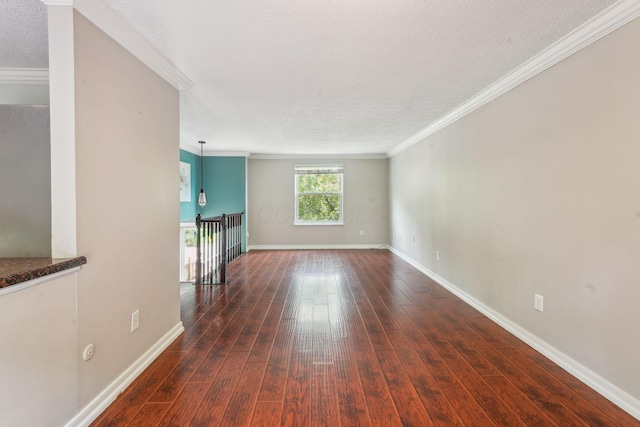 3840 Farm Brook Ln, Columbus, OH 43204 - unfurnished living room with dark wood-style flooring, ornamental molding, and a textured ceiling