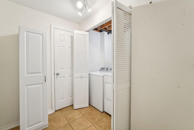3840 Farm Brook Ln, Columbus, OH 43204 - washroom featuring washer / dryer and light tile patterned floors