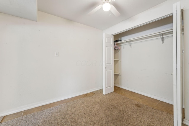 3840 Farm Brook Ln, Columbus, OH 43204 - unfurnished bedroom with tile patterned flooring, a closet, and ceiling fan