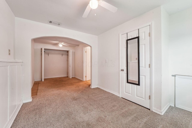 3840 Farm Brook Ln, Columbus, OH 43204 - hallway featuring arched walkways and carpet