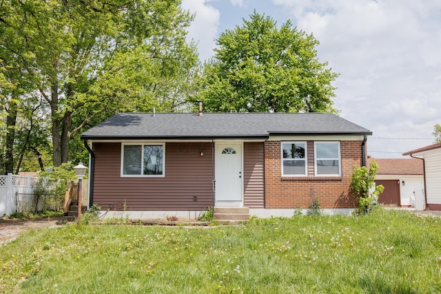 3852 Frazier Rd E, Columbus, OH 43207 - view of front of home with roof with shingles and brick siding
