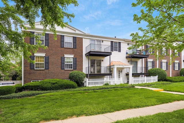 1530 Slade Ave Unit 101, Columbus, OH 43235 - townhome / multi-family property featuring a front yard