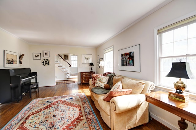 259 N Stanwood Rd, Columbus, OH 43209 - living area featuring crown molding, dark wood-style floors, arched walkways, and stairway