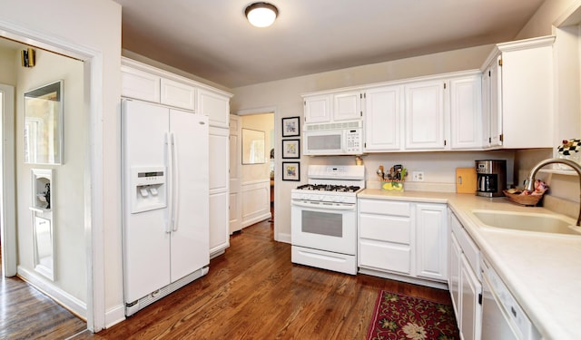 259 N Stanwood Rd, Columbus, OH 43209 - kitchen featuring white appliances, white cabinetry, and dark wood finished floors