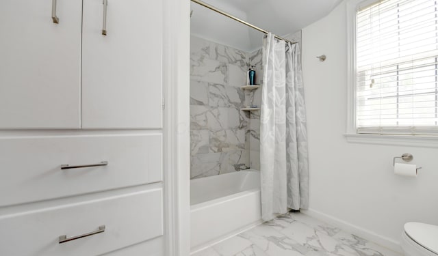 259 N Stanwood Rd, Columbus, OH 43209 - full bathroom featuring marble finish floors, plenty of natural light, and shower / bath combo with shower curtain