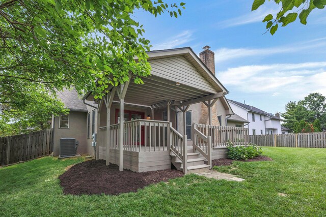 4583 Hunting Creek Dr, Grove City, OH 43123 - back of house with a deck, a chimney, and cooling unit