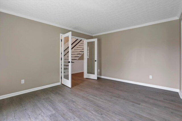 4583 Hunting Creek Dr, Grove City, OH 43123 - spare room featuring stairway, baseboards, wood finished floors, and crown molding