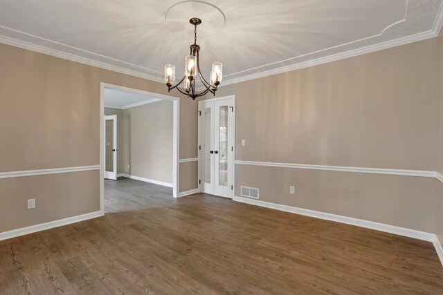4583 Hunting Creek Dr, Grove City, OH 43123 - spare room with a chandelier, dark wood-style floors, crown molding, and baseboards