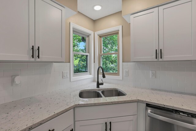 4583 Hunting Creek Dr, Grove City, OH 43123 - kitchen with dishwasher, a sink, decorative backsplash, and white cabinetry