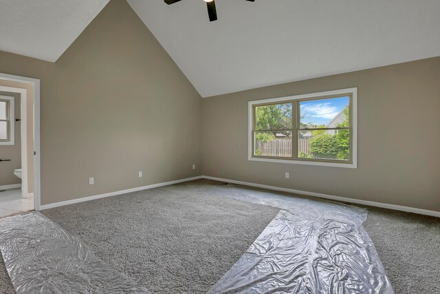 4583 Hunting Creek Dr, Grove City, OH 43123 - unfurnished bedroom with light carpet, lofted ceiling, baseboards, and ensuite bath