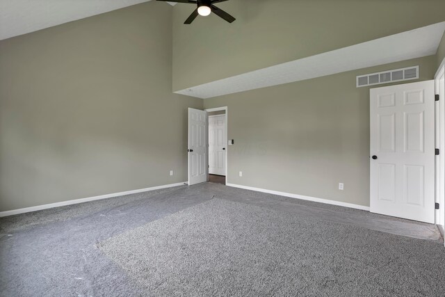 4583 Hunting Creek Dr, Grove City, OH 43123 - unfurnished room featuring a ceiling fan, dark carpet, baseboards, and high vaulted ceiling