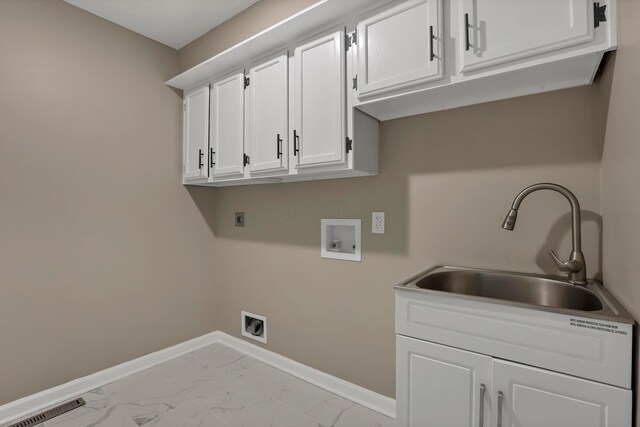 4583 Hunting Creek Dr, Grove City, OH 43123 - laundry area featuring electric dryer hookup, hookup for a washing machine, cabinet space, baseboards, and light marble finish flooring