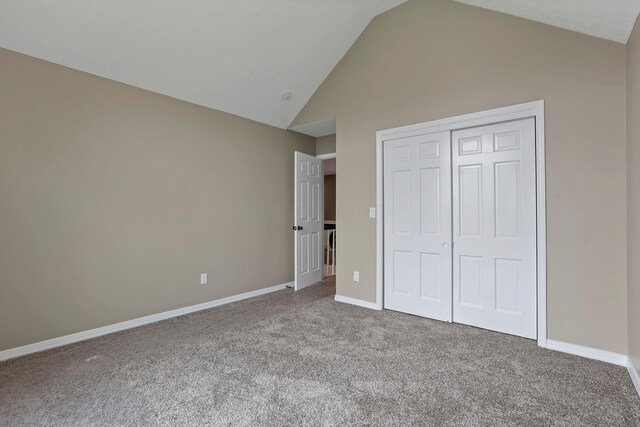 4583 Hunting Creek Dr, Grove City, OH 43123 - unfurnished bedroom featuring carpet, baseboards, a closet, and high vaulted ceiling