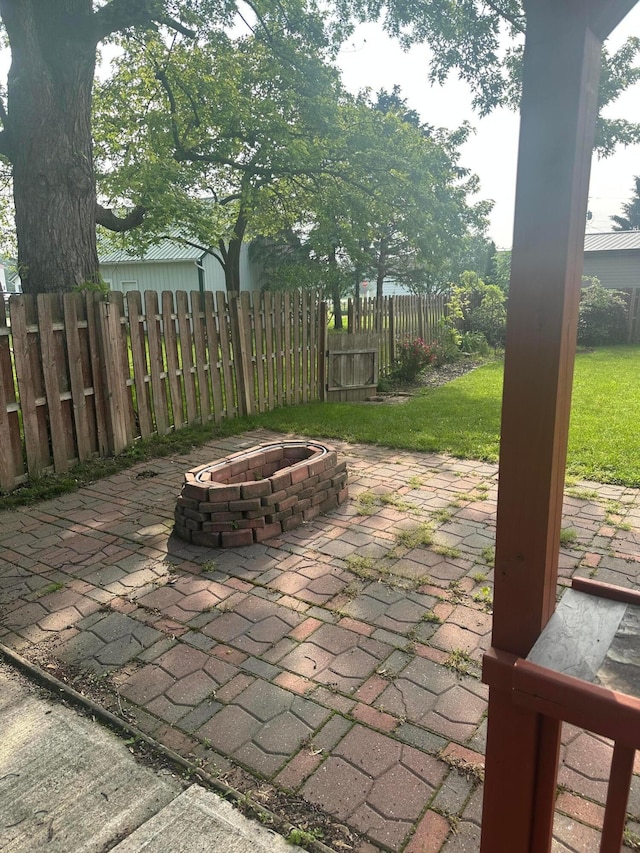 287 W Columbus St, Mount Sterling, OH 43143 - view of patio / terrace with an outdoor fire pit