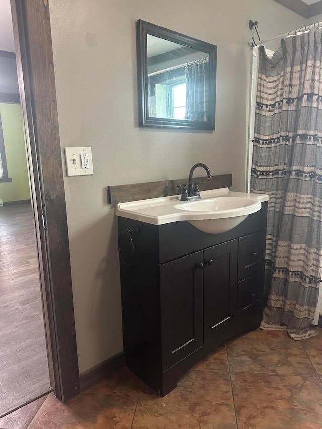 287 W Columbus St, Mount Sterling, OH 43143 - full bathroom with vanity, a shower with curtain, and baseboards