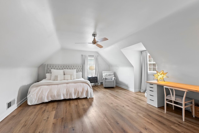 1572 Barrington Rd, Upper Arlington, OH 43221 - bedroom featuring wood finished floors, vaulted ceiling, baseboards, and ceiling fan