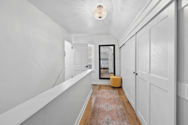 1572 Barrington Rd, Upper Arlington, OH 43221 - hallway with wood finished floors, baseboards, and lofted ceiling