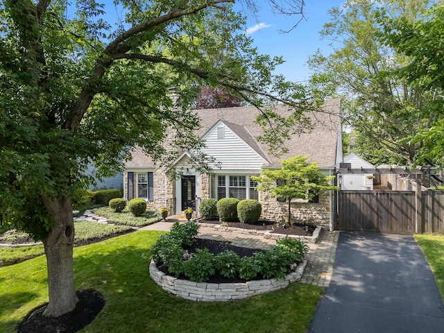 1572 Barrington Rd, Upper Arlington, OH 43221 - view of front of home with stone siding and a shingled roof