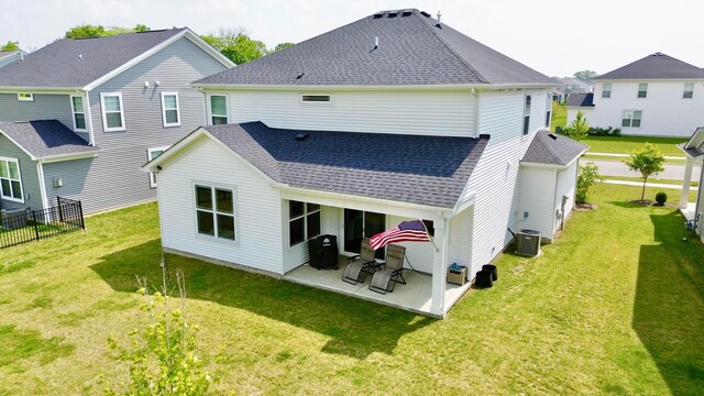 3895 Brody Dr, Grove City, OH 43123 - back of house featuring roof with shingles, a patio area, and central AC unit