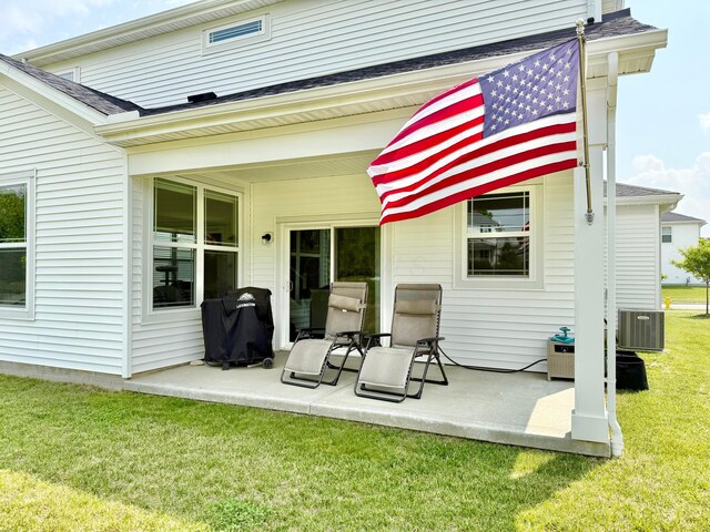 3895 Brody Dr, Grove City, OH 43123 - back of house featuring a patio, a lawn, central AC unit, and a shingled roof