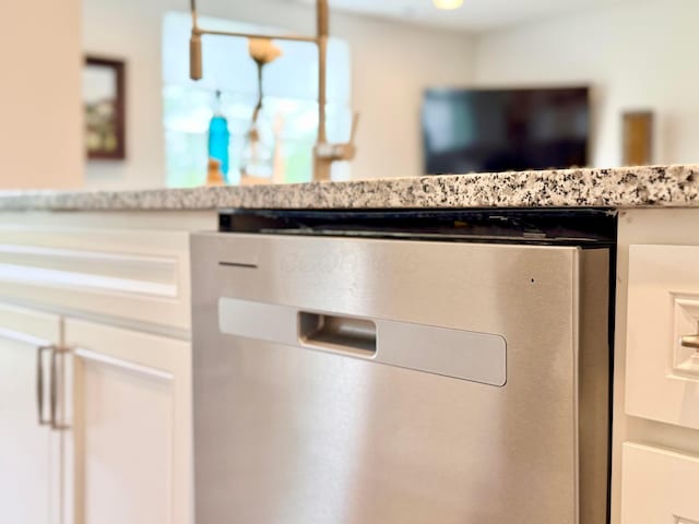 3895 Brody Dr, Grove City, OH 43123 - kitchen view of stainless steel dishwasher and light stone countertops