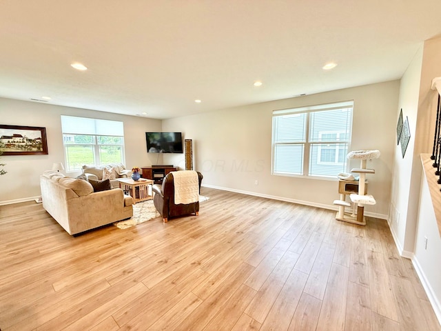 3895 Brody Dr, Grove City, OH 43123 - living area featuring light wood-style floors, recessed lighting, and baseboards